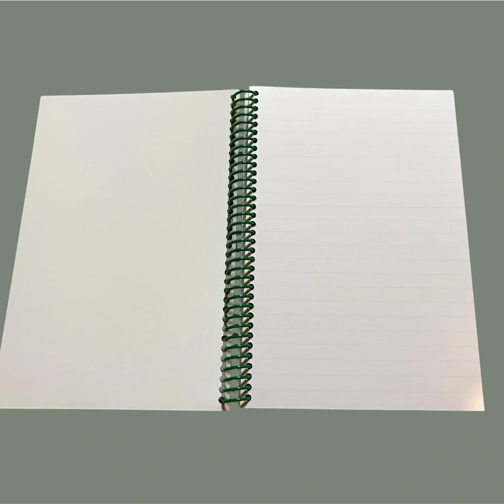 6 x 9” 200-page, spiral-bound journal with Skiing themed artwork, made in USA